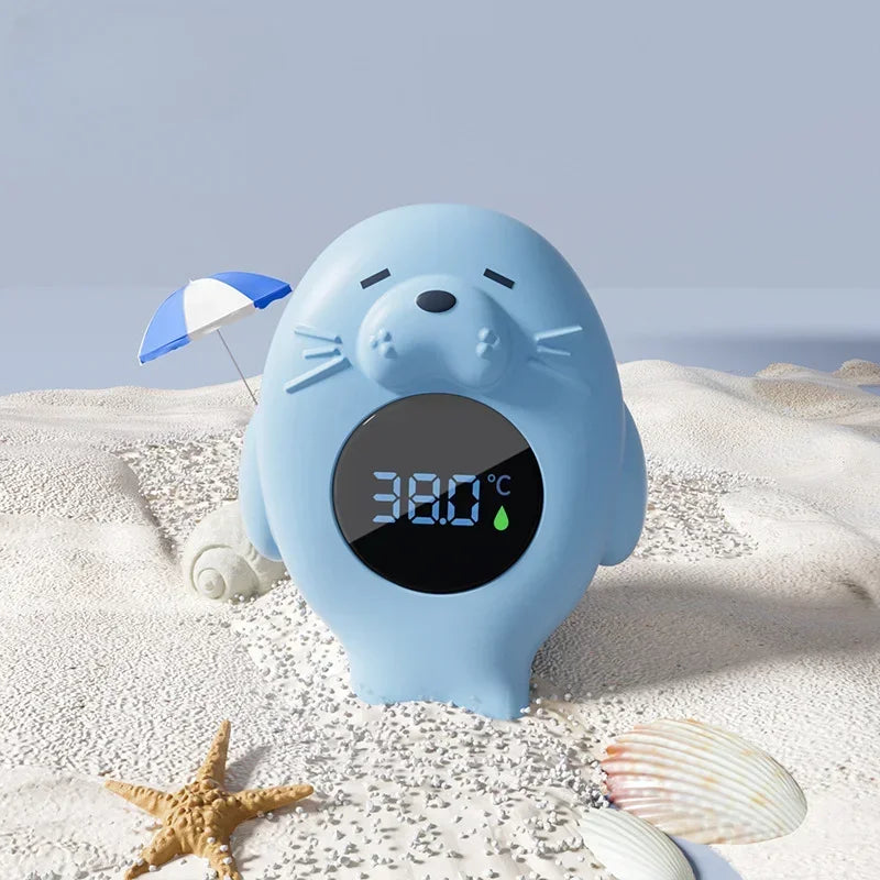 Bath thermometer for newborns, toddlers and young kids in blue sea otter style.
